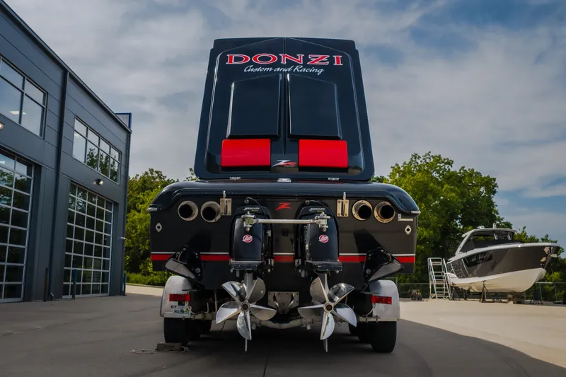 Slide: The Image of 2009 Donzi 38 ZRC speedboat on trailer, rear view, outdoors. - 23