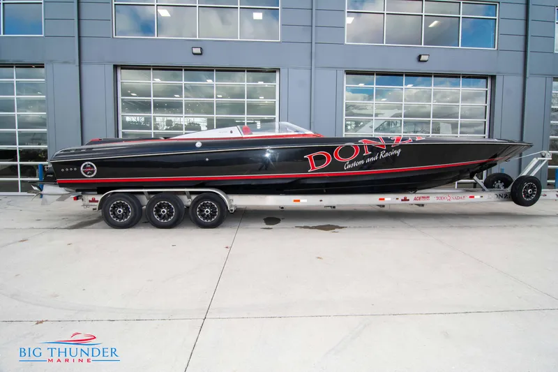 Slide: The Image of 2009 Donzi 38 ZRC speedboat on a trailer outside Big Thunder Marine. - 4