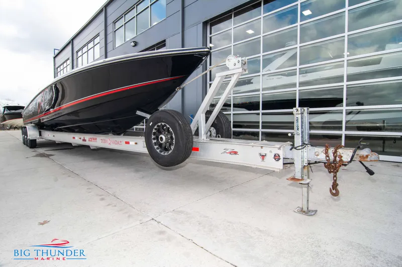 Slide: The Image of 2009 Donzi 38 ZRC boat on a trailer outside Big Thunder Marine. - 8