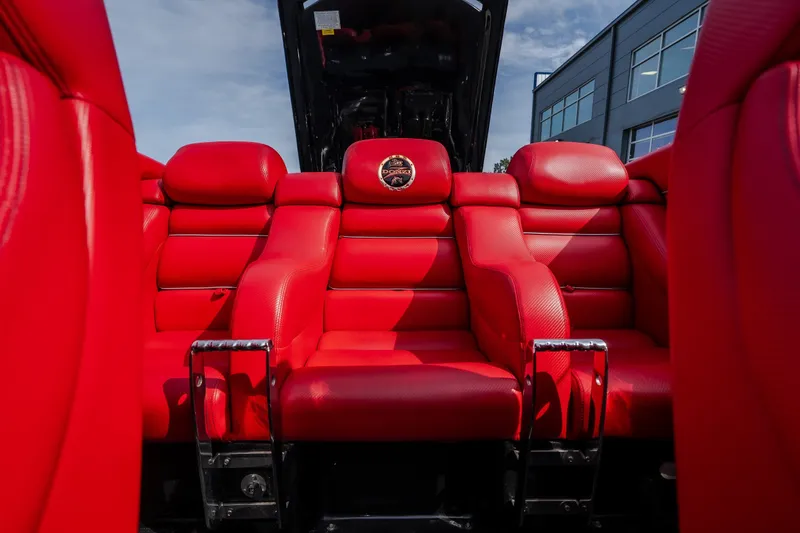 Slide: The Image of Luxurious red leather seating in a 2009 Donzi 38 ZRC boat interior. - 28
