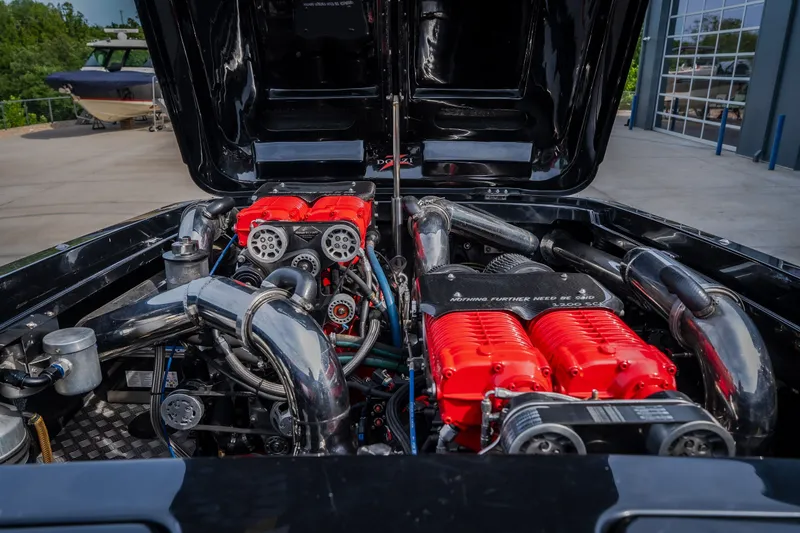 Slide: The Image of Engine compartment of a 2009 Donzi 38 ZRC with high-performance components. - 42
