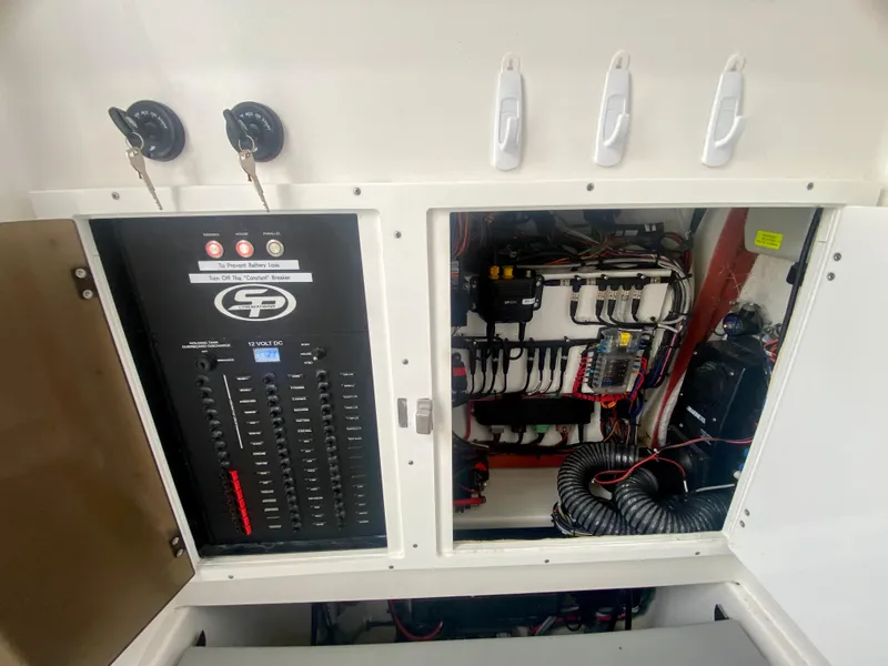 Slide: The Image of Electrical panel and wiring inside a 2022 Sea Pro 320 DXL boat. - 30
