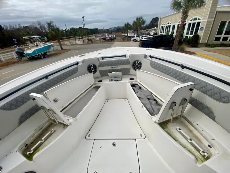 Slide: The Image of 2022 Sea Pro 320 DXL boat interior with open storage compartments. - 38