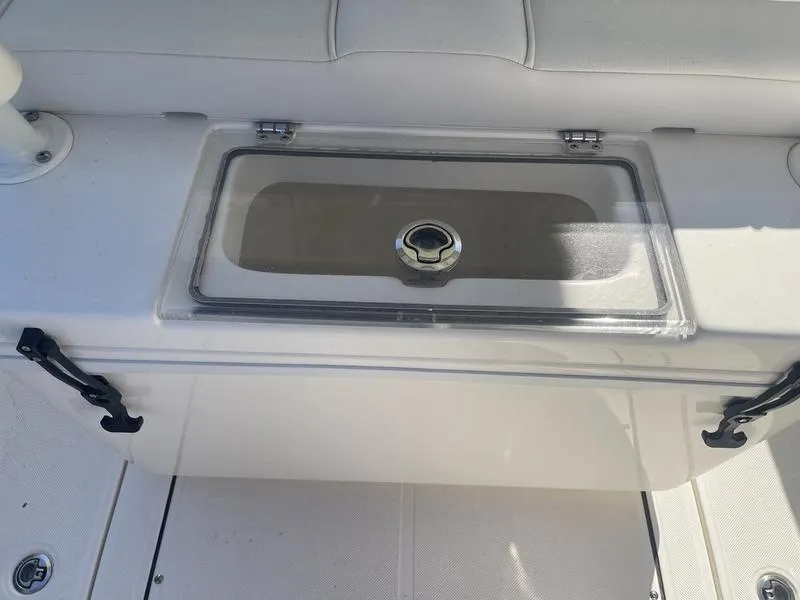 Slide: The Image of 2024 Sea Born SX239 Offshore boat livewell with clear lid. - 14