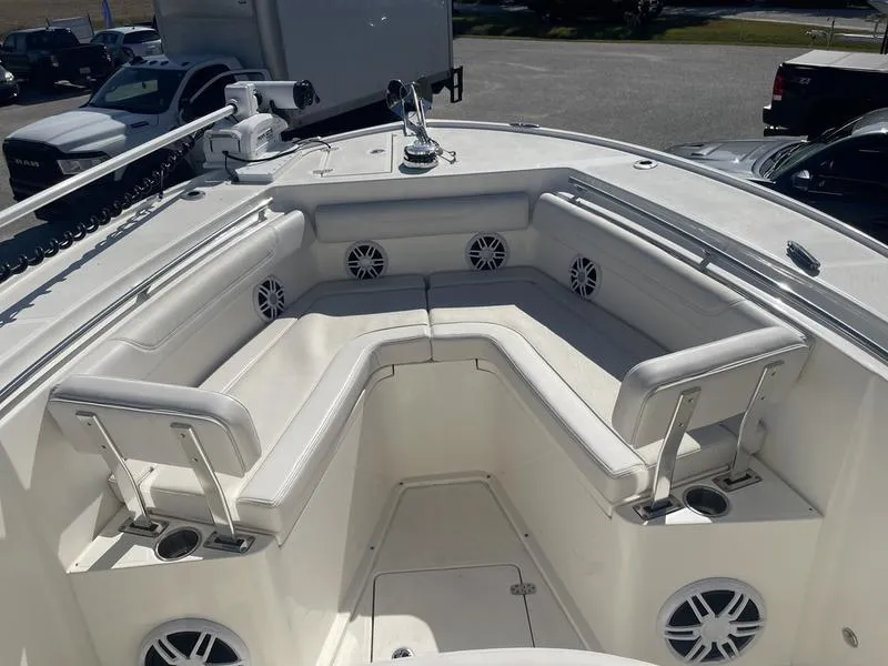 Slide: The Image of 2024 Sea Born SX239 Offshore boat with spacious seating and modern amenities. - 4