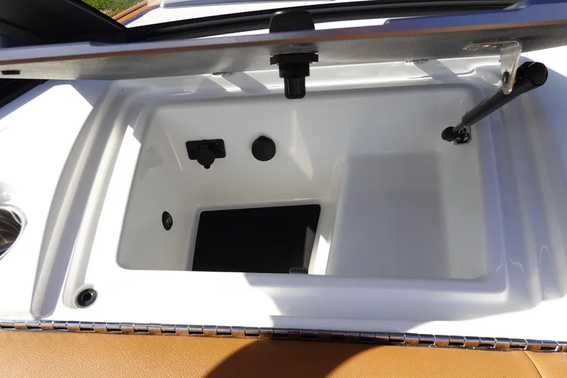 Slide: The Image of 2023 Malibu Wakesetter 24 MXZ storage compartment. - 15