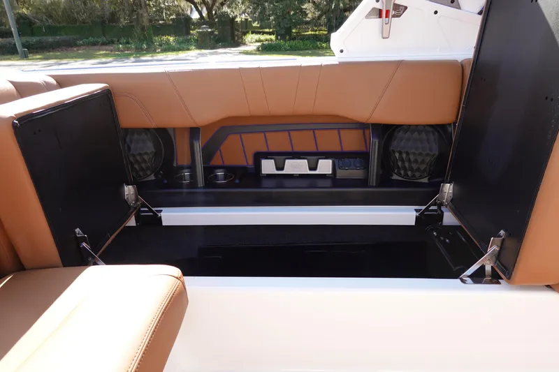 Slide: The Image of 2023 Malibu Wakesetter 24 MXZ boat interior storage compartments. - 28