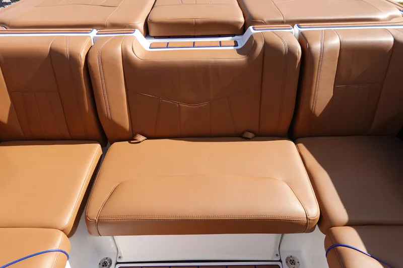 Slide: The Image of 2023 Malibu Wakesetter 24 MXZ tan leather seating. - 35