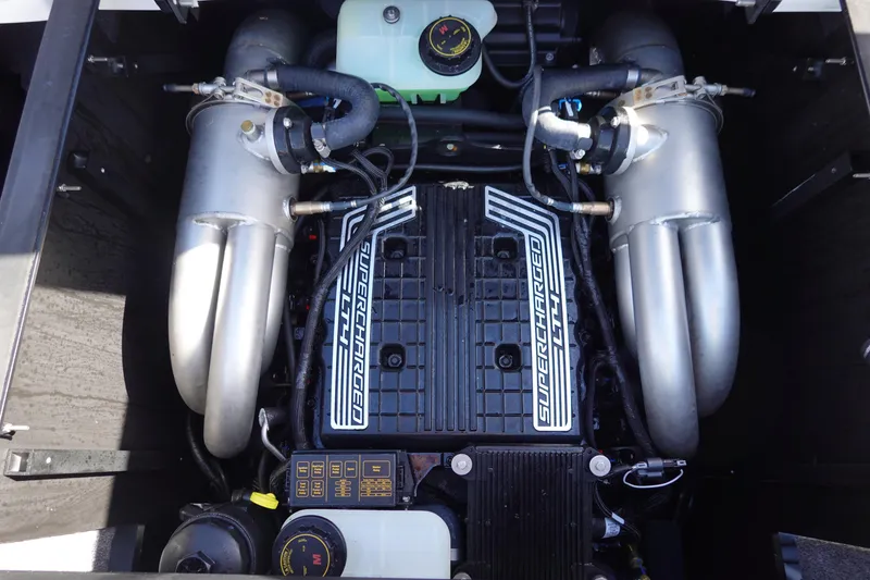 Slide: The Image of 2023 Malibu Wakesetter 24 MXZ engine compartment with supercharged 6.2L engine. - 43