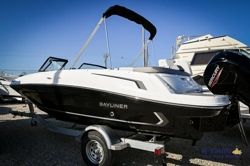 The Image of 2024 Bayliner VR5 boat on trailer with Mercury outboard motor. - 0