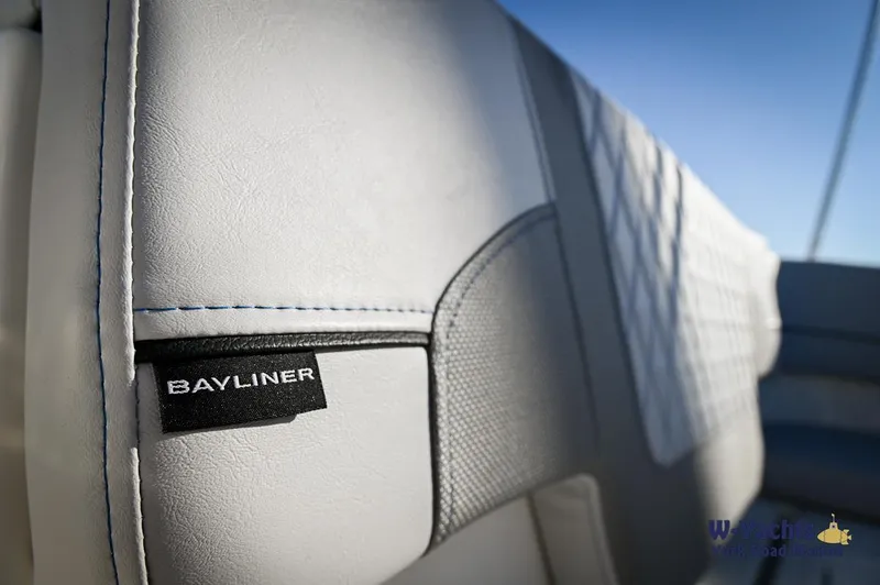 Slide: The Image of Close-up of 2024 Bayliner VR5 boat seat with logo. - 25