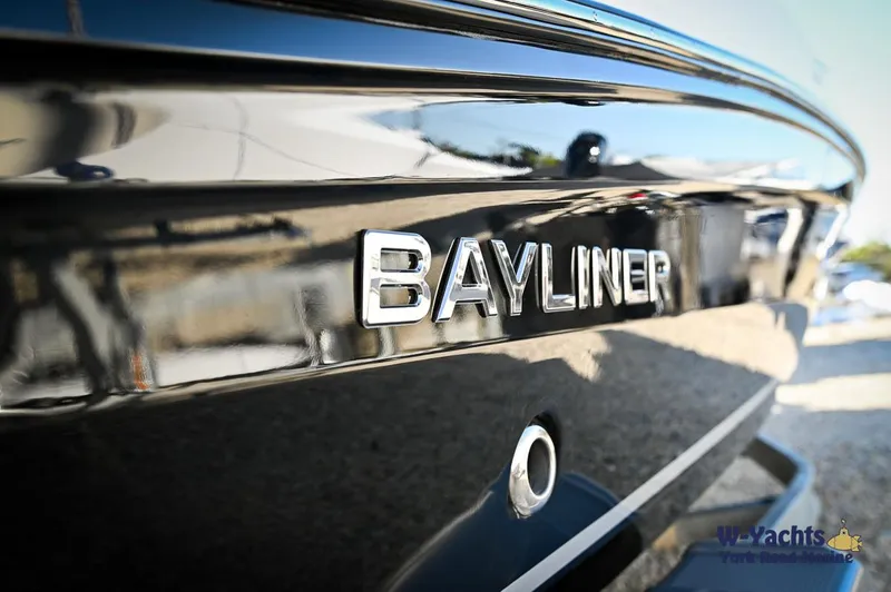Slide: The Image of Close-up of 2024 Bayliner VR5 boat exterior with logo. - 30