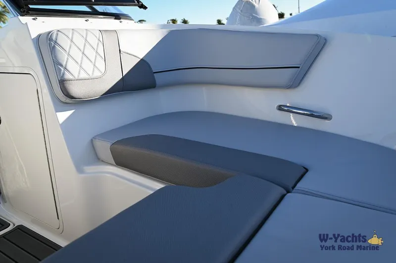 Slide: The Image of 2024 Bayliner VR5 boat interior seating with gray upholstery. - 4