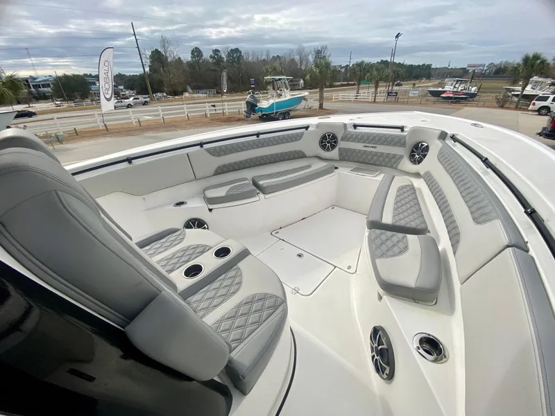 Slide: The Image of 2022 Sea Pro 320 DXL boat with spacious seating and modern design. - 31