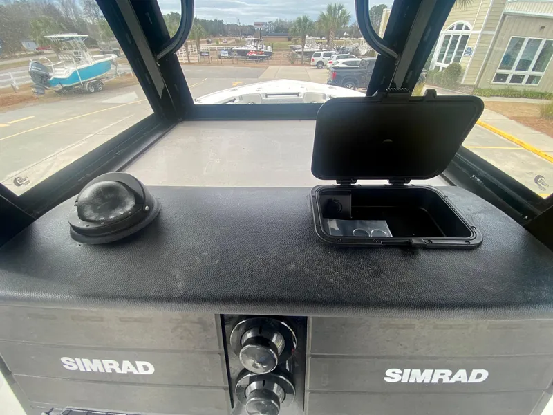 Slide: The Image of Control panel of 2022 Sea Pro 320 DXL boat with Simrad electronics. - 23