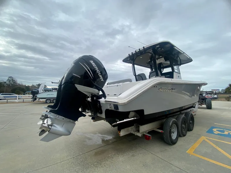Slide: The Image of 2022 Sea Pro 320 DXL boat on trailer with Mercury outboard motor. - 4