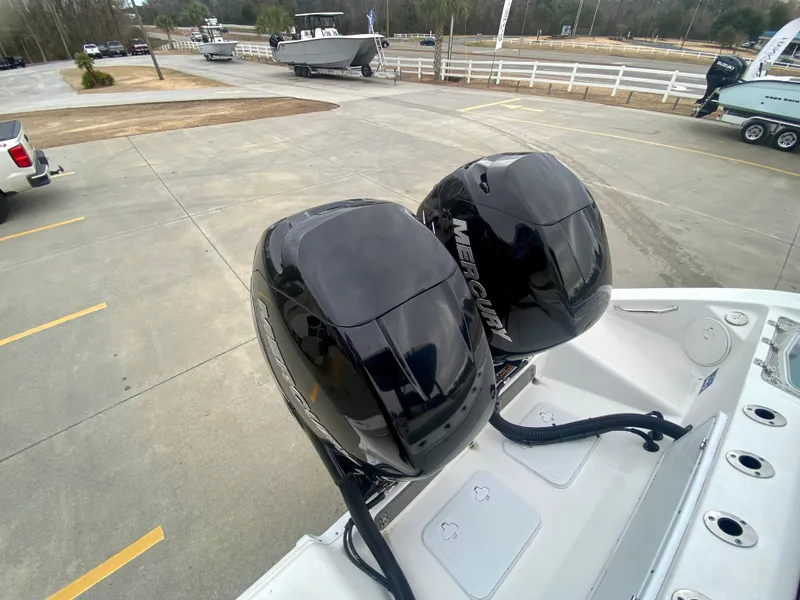 Slide: The Image of 2022 Sea Pro 320 DXL boat with dual Mercury outboard engines. - 6
