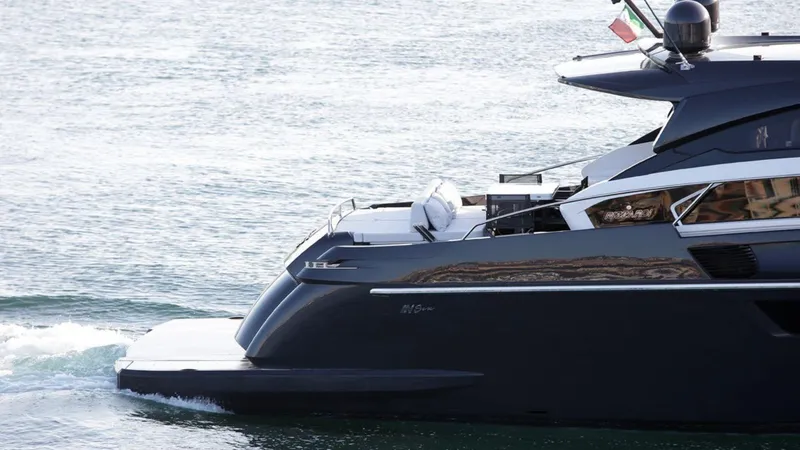 Slide: The Image of 2024 Rizzardi IN SIX luxury yacht cruising on water. - 6