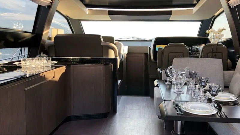 Slide: The Image of Luxurious interior of the 2024 Rizzardi IN SIX yacht with elegant dining setup. - 7
