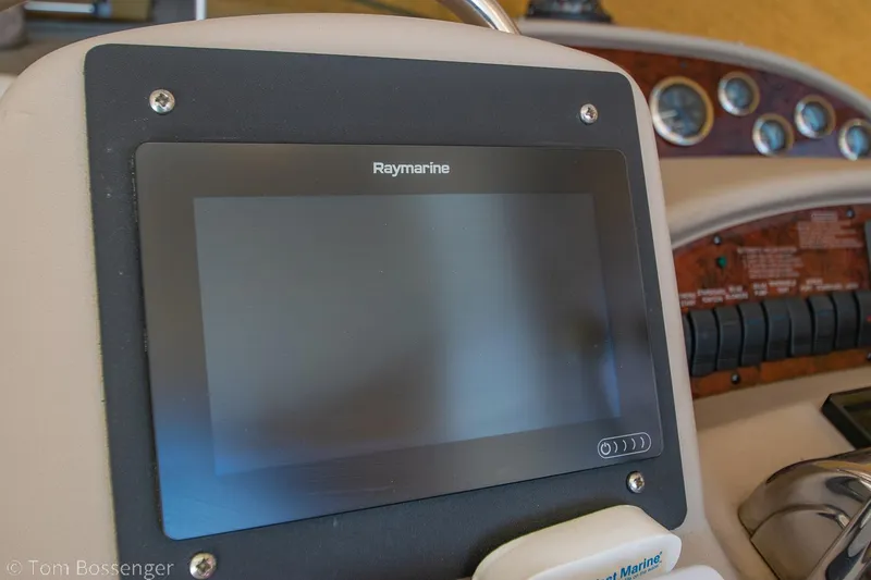 Slide: The Image of Raymarine display on 1999 Sea Ray 340 Sundancer boat dashboard. - 25