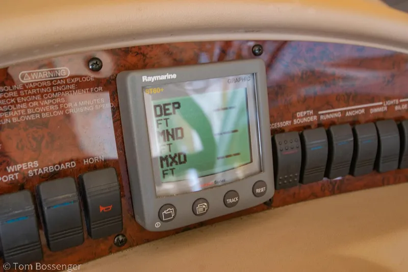 Slide: The Image of Control panel of a 1999 Sea Ray 340 Sundancer boat with Raymarine display. - 26
