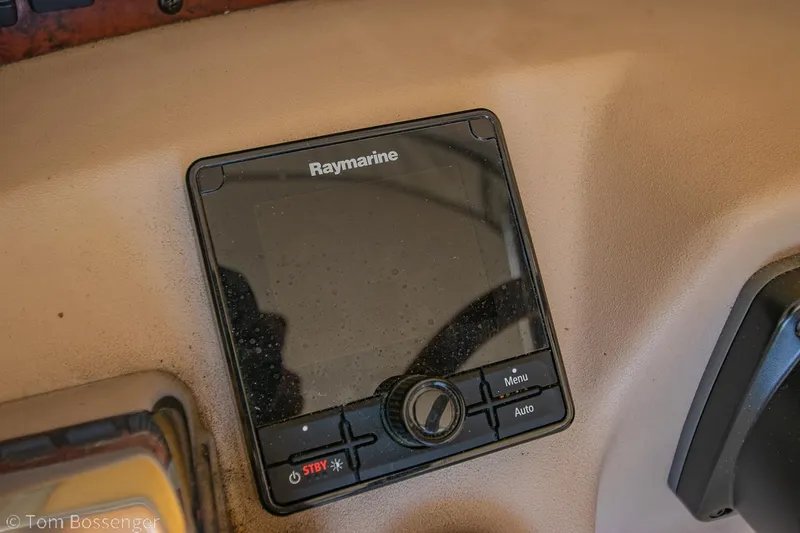 Slide: The Image of Raymarine navigation system on 1999 Sea Ray 340 Sundancer boat dashboard. - 27