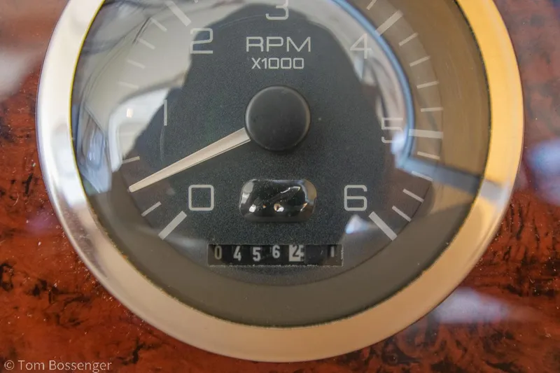 Slide: The Image of Close-up of a 1999 Sea Ray 340 Sundancer RPM gauge displaying 4562 hours. - 34