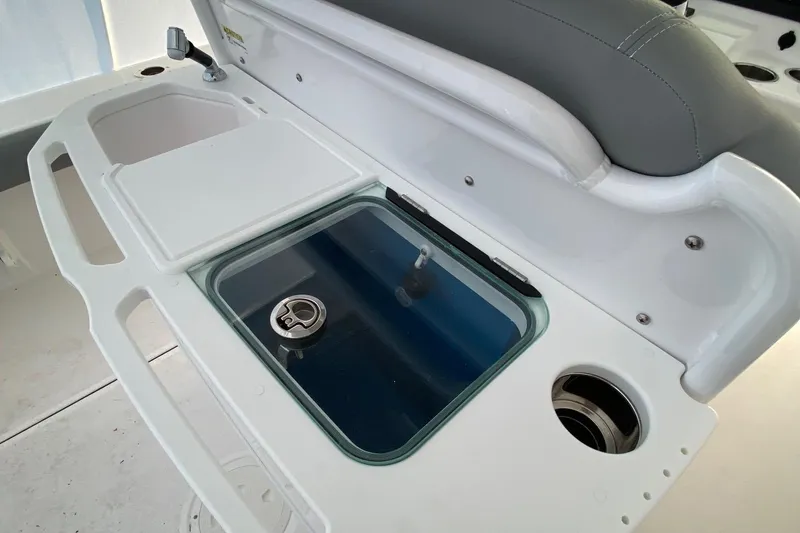 Slide: The Image of 2023 Everglades 273 boat interior with livewell and storage compartments. - 3