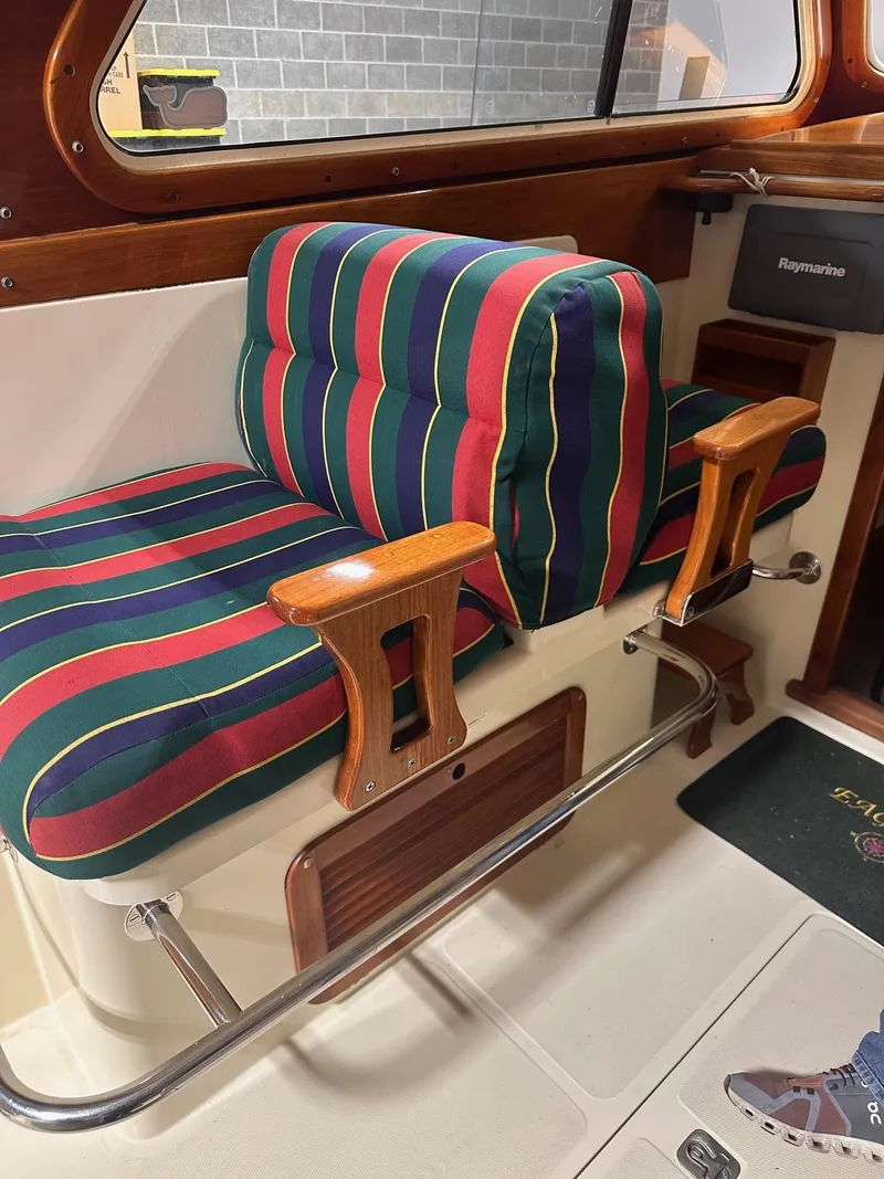 Slide: The Image of Colorful striped seating in 2001 Hinckley 36 Picnic Boat interior. - 9