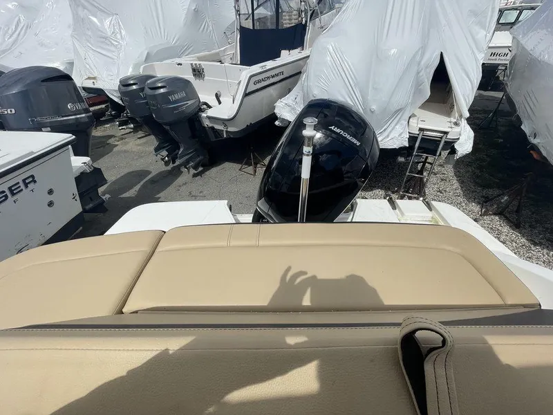 Slide: The Image of 2021 Sea Ray 210 SPX OB boat with outboard motor in storage yard. - 6