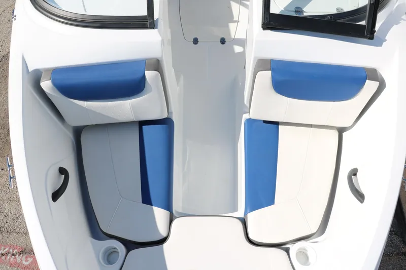 Slide: The Image of 2020 Tahoe 450 TS boat interior with blue and white seating. - 18