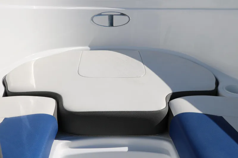 Slide: The Image of Interior seating of a 2020 Tahoe 450 TS boat with blue and white cushions. - 27