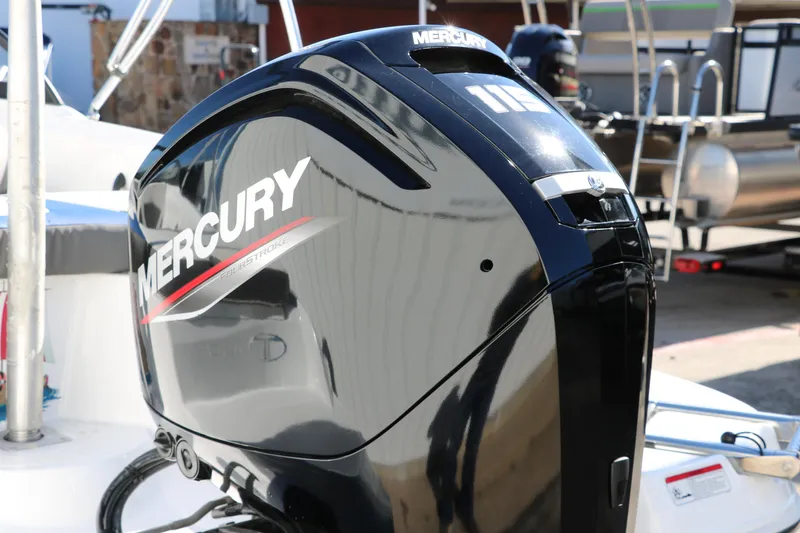 Slide: The Image of 2020 Tahoe 450 TS boat with Mercury outboard motor. - 28