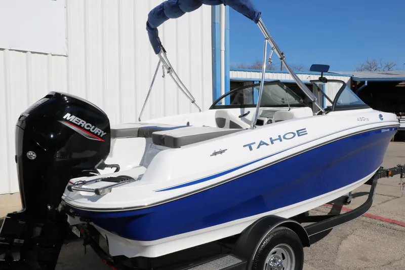 Slide: The Image of 2020 Tahoe 450 TS boat with Mercury outboard motor. - 3