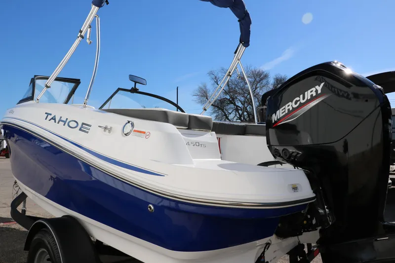 Slide: The Image of 2020 Tahoe 450 TS boat with Mercury outboard motor. - 6