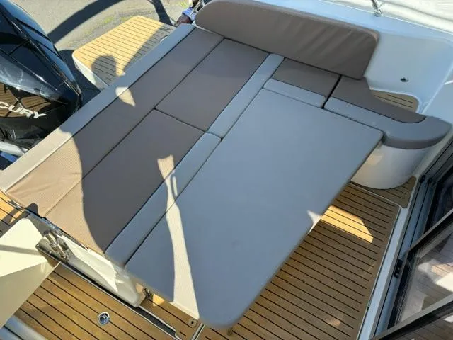 Slide: The Image of 2024 Bayliner TROPHY 25 EXPLORER boat with cushioned deck seating. - 28