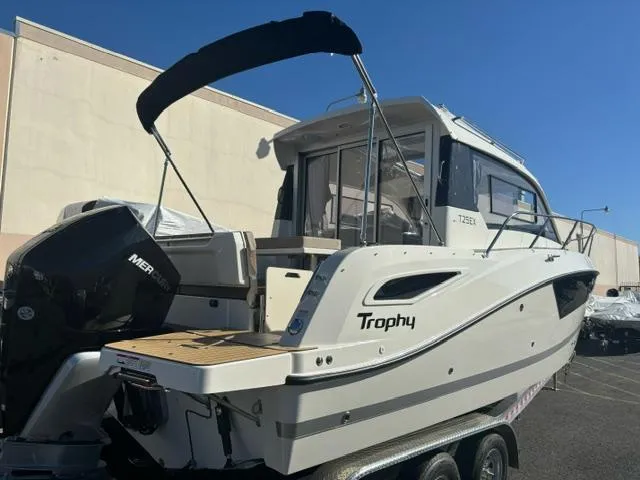 Slide: The Image of 2024 Bayliner TROPHY 25 EXPLORER boat on trailer, rear view. - 3