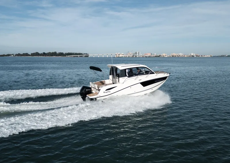 Slide: The Image of 2024 Bayliner TROPHY 25 EXPLORER cruising on open water. - 33