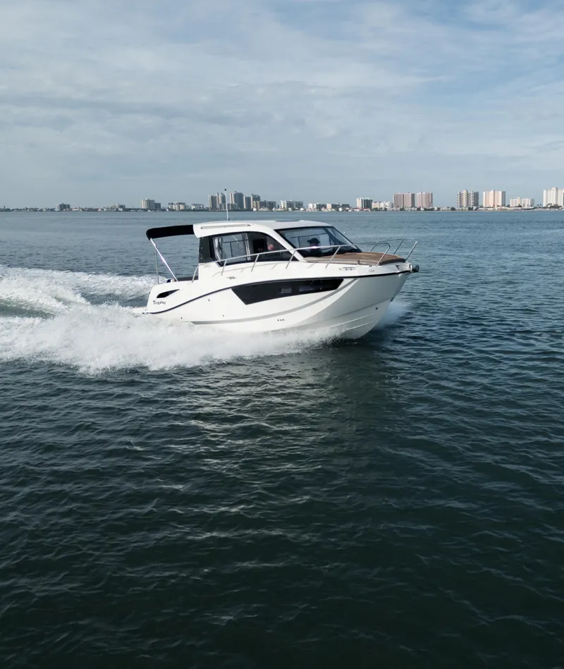 Slide: The Image of 2024 Bayliner TROPHY 25 EXPLORER cruising on open water. - 34