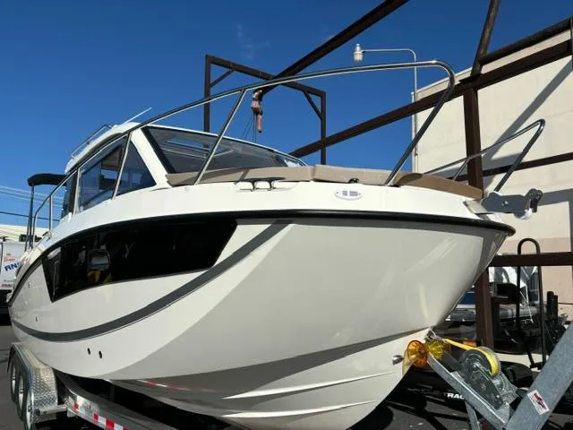 Slide: The Image of 2024 Bayliner TROPHY 25 EXPLORER boat on a trailer, ready for adventure. - 4