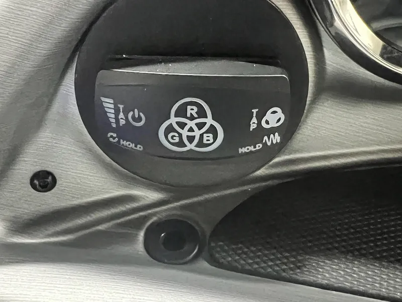 Slide: The Image of Control panel of 2024 Berkshire 25RFC STS boat with various function buttons. - 16