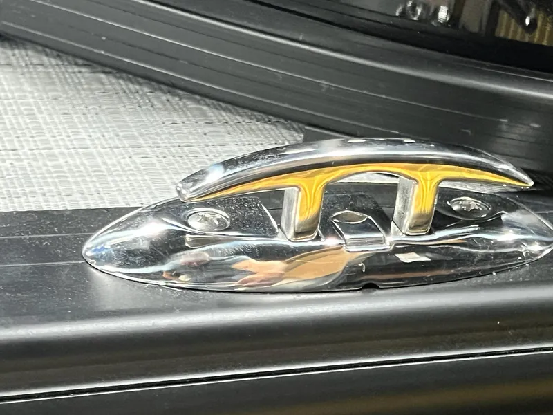 Slide: The Image of Close-up of a cleat on a 2024 Berkshire 25RFC STS boat. - 6