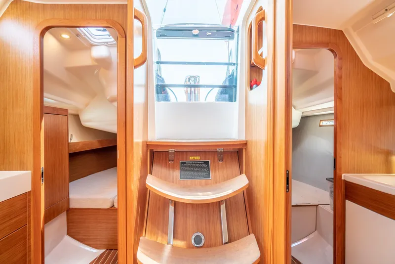 Slide: The Image of Interior of 2016 Dehler 38 sailboat with wooden finish and cabin access. - 22