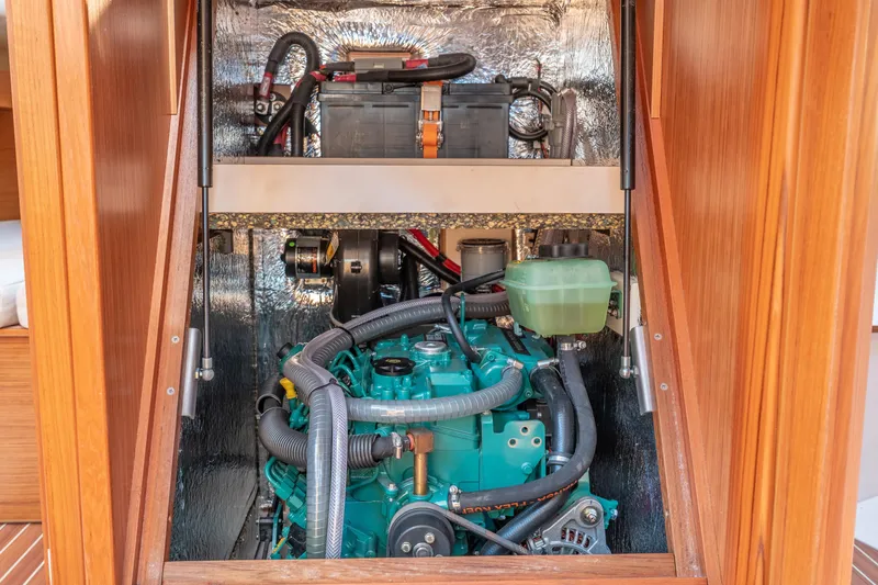 Slide: The Image of Engine compartment of a 2016 Dehler 38 sailboat with visible components. - 23