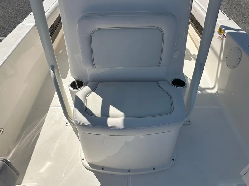 Slide: The Image of 2024 Sea Born FX25 Bay boat seating area with cup holders. - 21