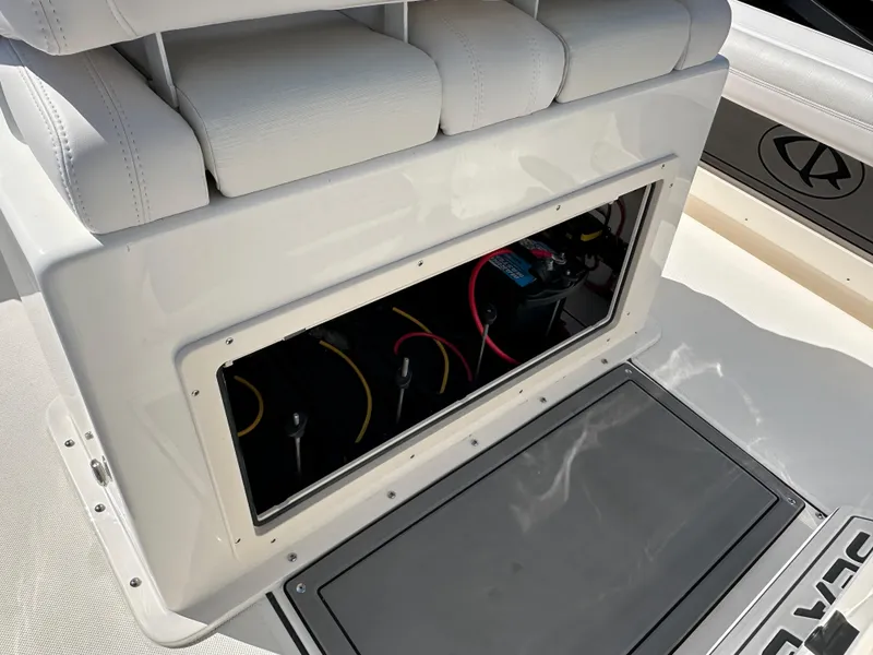 Slide: The Image of 2024 Sea Born FX25 Bay boat interior with open storage compartment. - 27