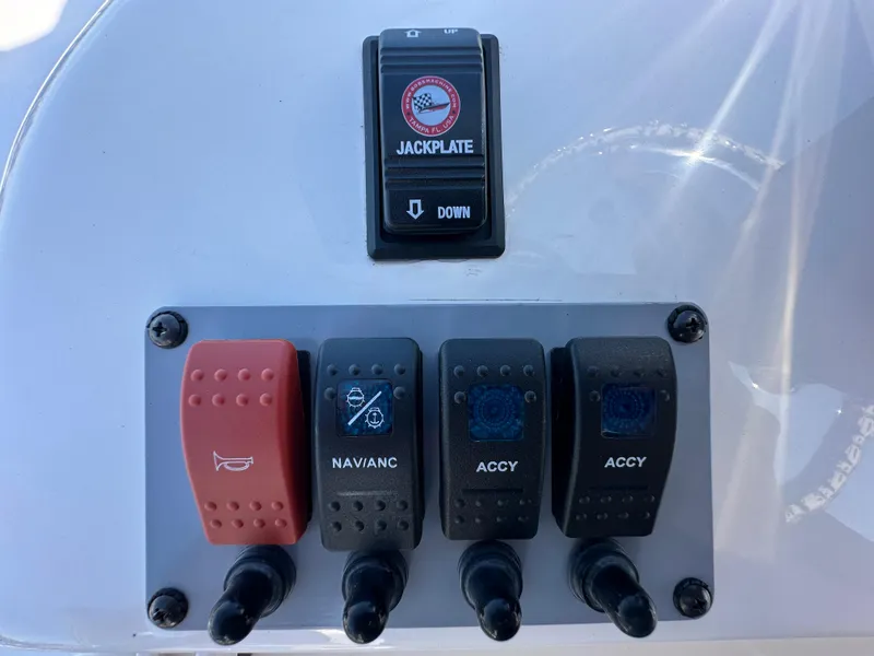 Slide: The Image of Control panel of 2024 Sea Born FX25 Bay boat with switches and jackplate. - 40