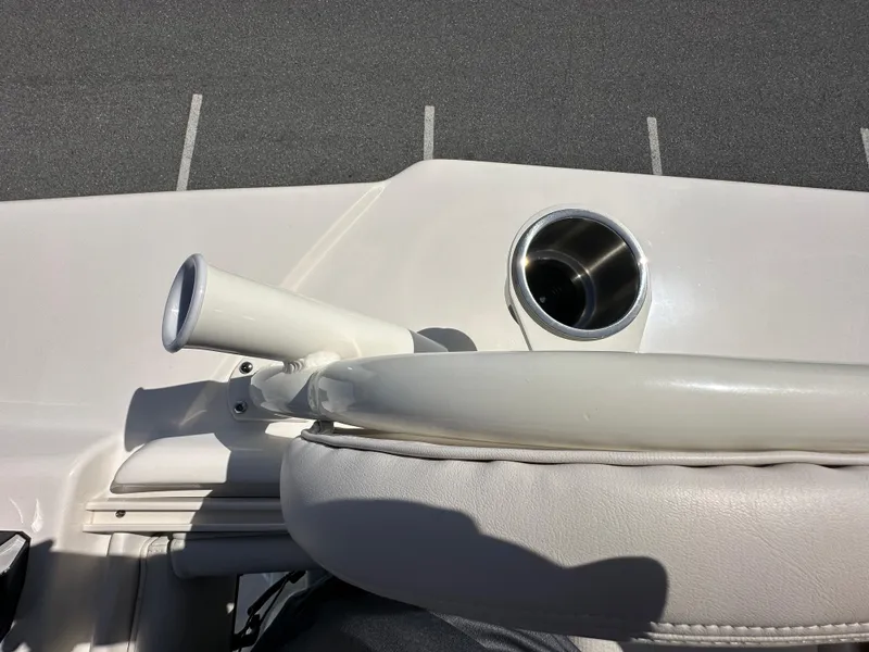 Slide: The Image of Close-up of 2024 Sea Born FX25 Bay boat's helm and cup holder. - 41