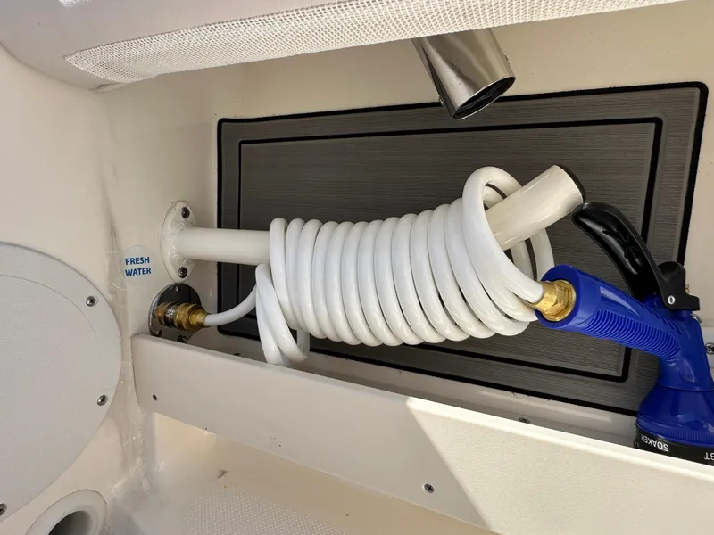 Slide: The Image of 2024 Sea Born FX25 Bay boat fresh water hose and nozzle. - 49