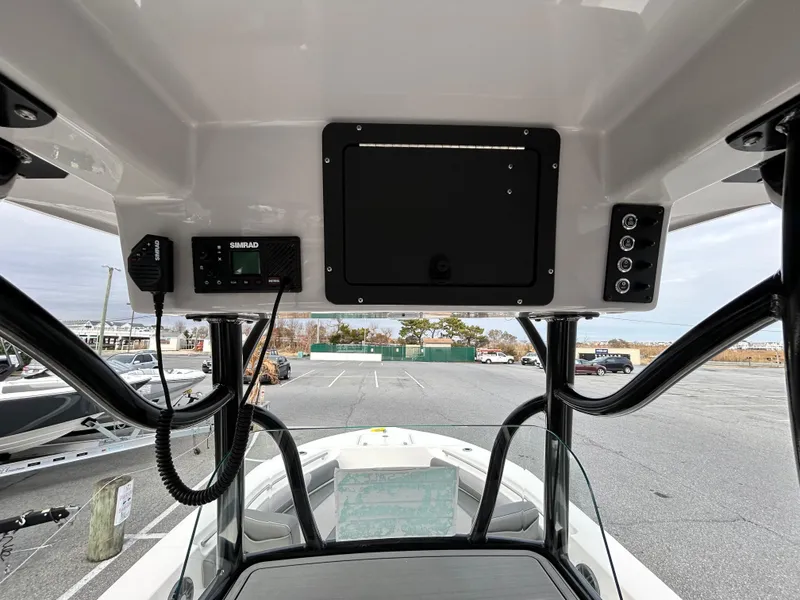 Slide: The Image of 2024 Sea Born LX 22 LE boat console with electronics and controls. - 11